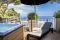 Eight Hotel Paraggi. La Suite 888. Open-space tutto tecnologico con affaccio sulla baia di Paraggi. Una Jacuzzi con acqua riscaldata sul terrazzo.