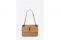 Yves Saint Laurent. Borsa monogram in paglia decorata con impunture chevron, iniziali YSL rivestite in pelle e tracolla trasformabile in pelle e catena.