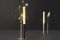 Cini&Nils. “Ognidove”, luce d’atmosfera wireless con dimmer touch - nelle versioni da tavolo e da terra - è composta da due elementi liberamente abbinabili tra loro e disponibili in diverse finiture, oro, argento e nero opaco. La base, dotata di calamita, è realizzata in ferro, la lampada e il vaso in alluminio, il diffusore è in metacrilato trasparente finemente opacizzato in superficie. Il corpo illuminante è completo di batteria ricaricabile agli ioni di litio con un autonomia minima di 7 ore. Design Luta Bettonica e Giancarlo Leone.