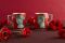 Ginori 1735. Mug Red Coral Il Viaggio di Nettuno. Designer: Luke Edward Hall. Ceramica decorata a mano con metalli preziosi. Prezzo: euro 85,00.