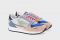 Emporio Armani. Sneakers in suede e mesh multicolor. Inserti dalle texture differenti con effetto patchwork e tonalità a contrasto. Composizione 100% Pelle di bovino, Poliestere, Poliammide. Prezzo: euro 190,00.