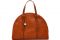 Il Bisonte. Borsa da viaggio unisex in tessuto tecnico, indossabile a mano e a spalla, con doppio manico e profili in pelle di vacchetta conciata al vegetale. Made in Italy. Manici in pelle regolabili con fibbie di ottone. Chiusura a zip con doppio cursore e lucchetto di ottone con laccetto in vacchetta. L'interno, sfoderato, ospita una tasca con chiusura a zip. Prezzo: euro 695,00.