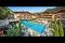 Hotel Quelle Nature Spa Resort. Una panoramica della struttura che quest’anno ha avuto il riconoscimento della quinta stella. Nell'immagine la Infinity Pool e l'hotel.