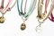 Millefiori Milano. Millefiori Essentials.  Rondò, il braccialetto costituito da quattro anelli colorati e profumati, impreziositi da inserti di metallo (Euro 14.90 cad.).